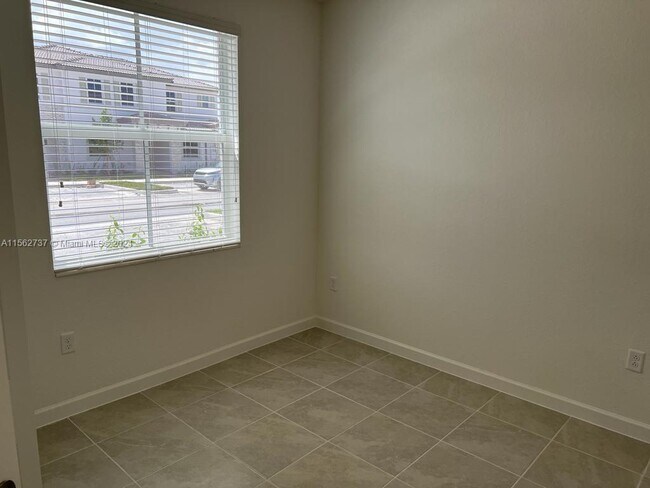 Building Photo - 12235 NW 23rd Ave