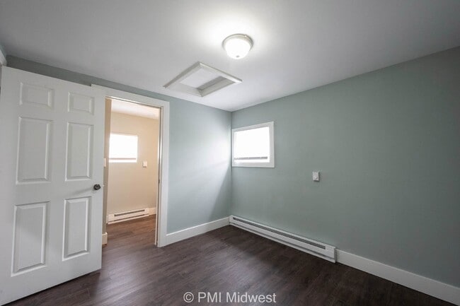 Building Photo - Charming 1-Bedroom Duplex with Modern Amen...