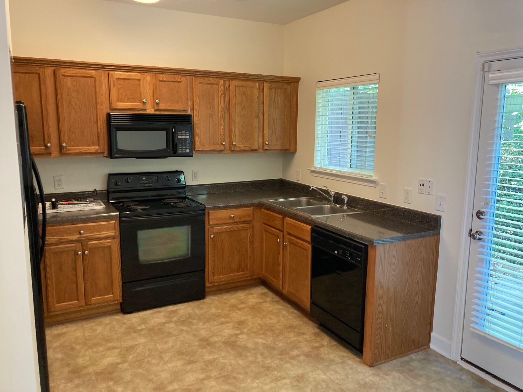 Kitchen connects to main living space - 3535 Bell Rd