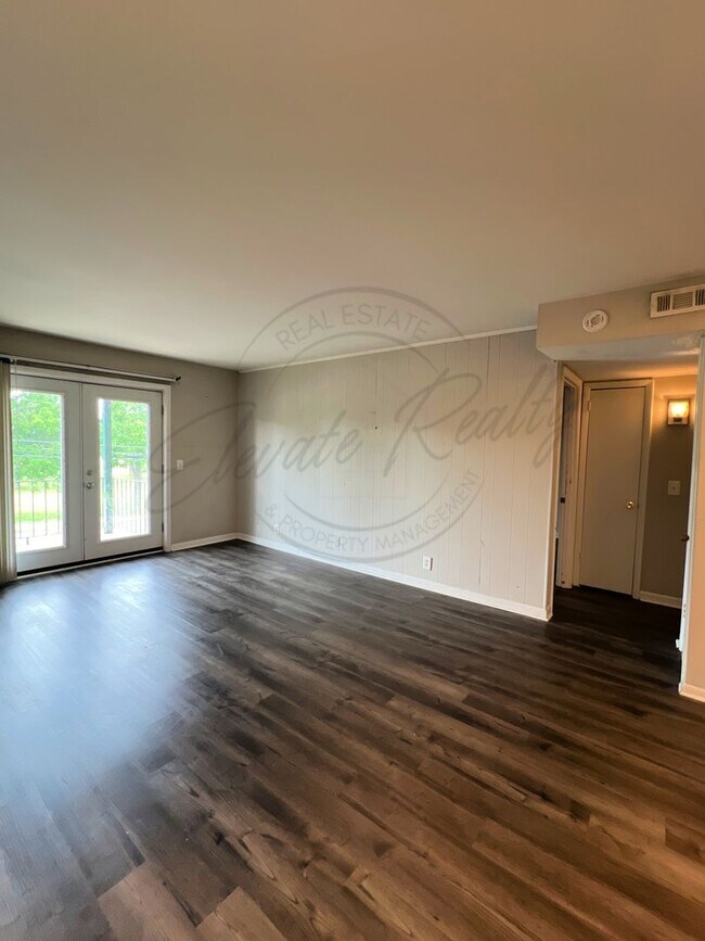 Building Photo - One Bedroom Condo, FIRST FLOOR, Assigned P...