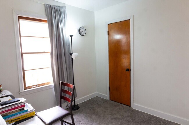 Building Photo - Charming home with a finished basement and...