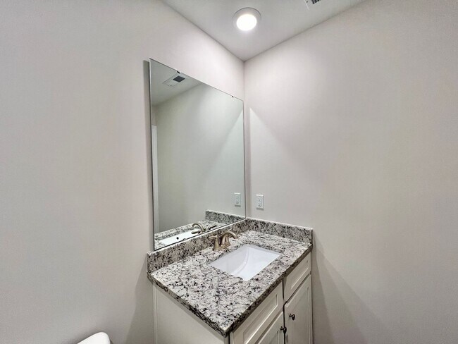 Building Photo - Stunning 3BD, 3BA End Unit Raleigh Townhome on a Corner Lot with High End Features in an HOA Comm...