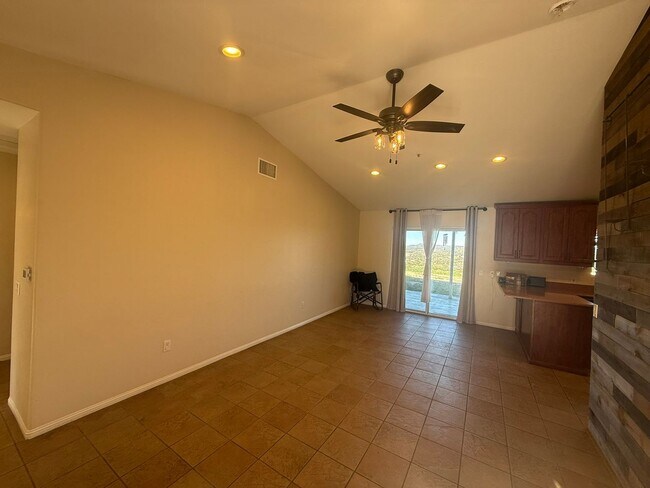 Building Photo - 4BR/2BA HOME w/ attached garage, usable land, fenced in back yard in CAMPO available!