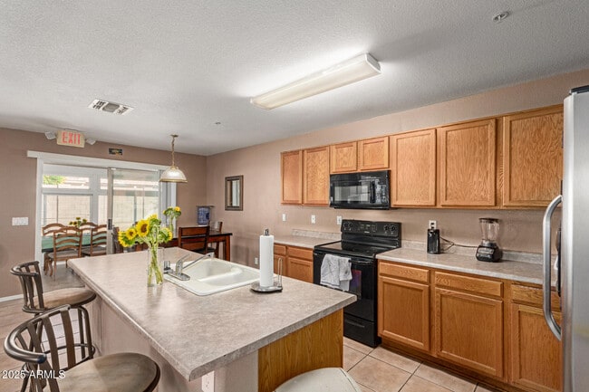 Building Photo - 8572 W Palo Verde Ave