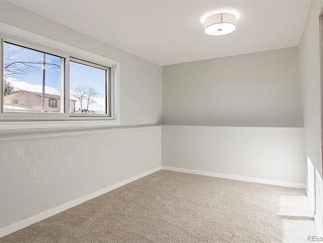 Building Photo - Lovely 4-Bedroom, 2-Bath Home in Aurora with Large Backyard and 2-Car Attached Garage!