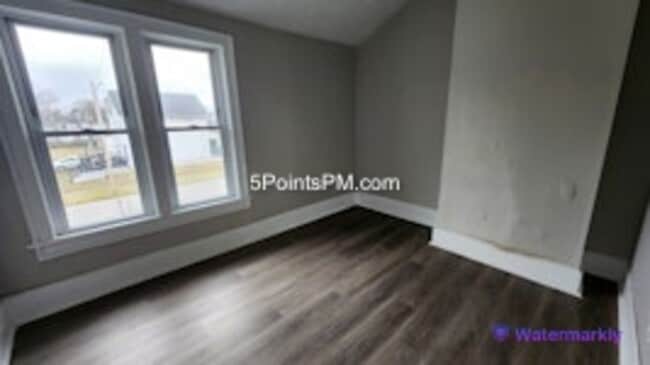 Building Photo - 9804 Miles Ave