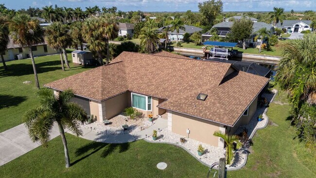 Building Photo - 3 BEDROOM • 2 BATHROOM • PRIVATE POOL • WATERFRONT • BOAT LIFT • ZERO DEPOSIT MOVE-IN AVAILABLE