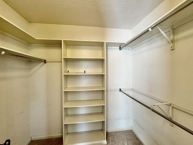 Building Photo - Available 06-15-25! End-Unit Condo w/2 Pri...