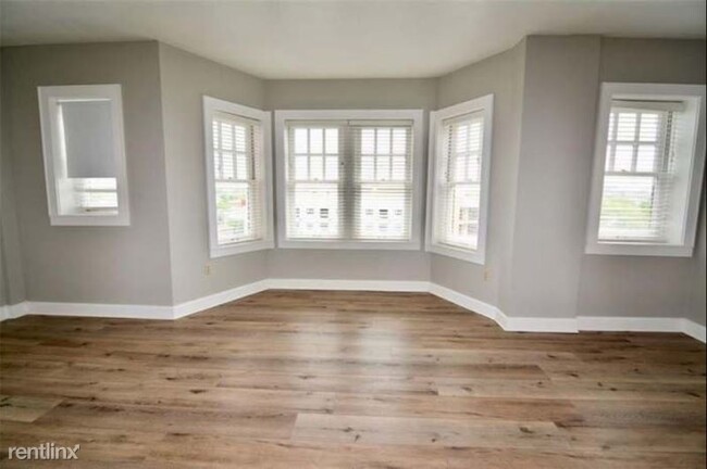 Primary Photo - Studio, 1 bath Condo - 230 E 9th St