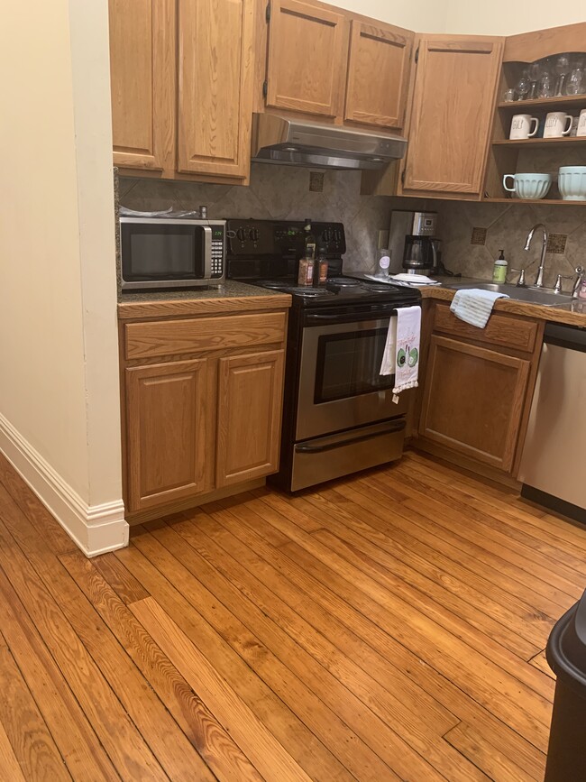 Modern Kitchen: Granite and Stainless - 1617 W Grace St