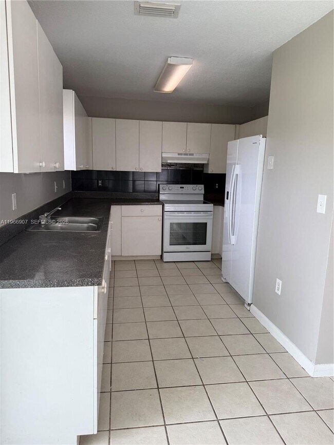 Building Photo - 1205 NW 7th Ave