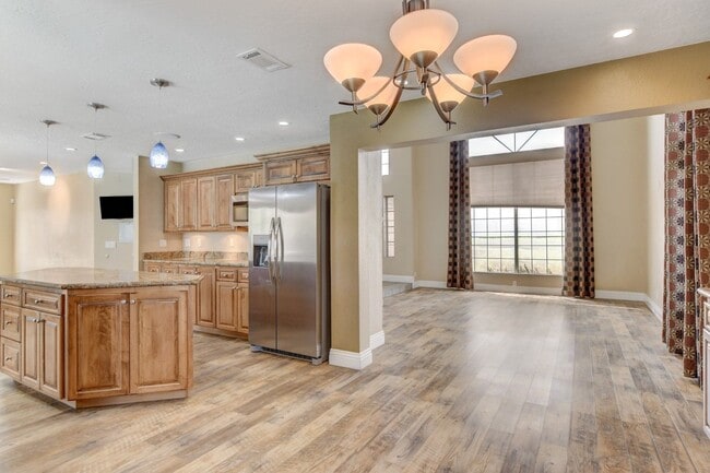 Building Photo - Gorgeous 4 Bedroom, 2 Story Home with a Beautiful Pool in the Lakes!