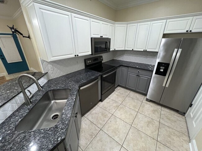 Building Photo - Must See! 2 BR 2 BA condominium located in...