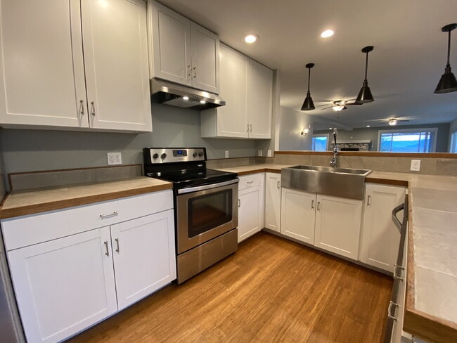 Building Photo - Spacious 2-Bed, 2-Bath Duplex Retreat Over...