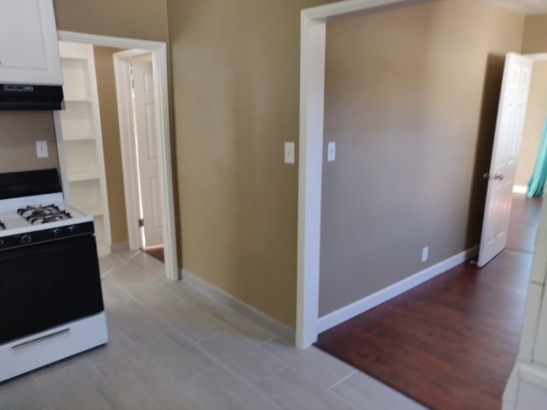 kitchen showing hallway and dining area - 6414 10th Ave