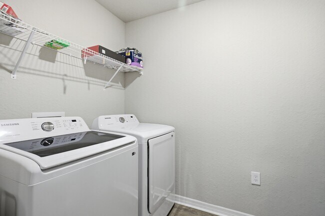 Building Photo - 3BR Center Lake Townhome | 2-Car Garage, Loft & Resort-Style Amenities