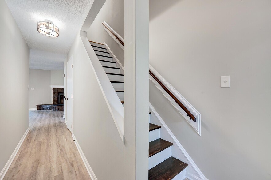 Walking through the front door you have the staircase, a coat closet and half bathroom - 4115 Arckelton Dr