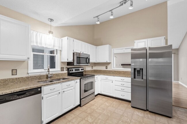 Building Photo - Spacious 4-Bedroom Carrboro Home with Dual Primary Suites & Community Amenities