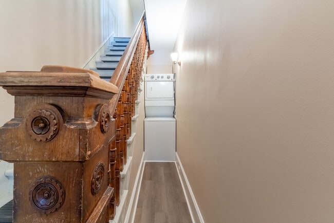 Laundry is located next to the stairs. Full sized washer and dryer. - 506 Washington St