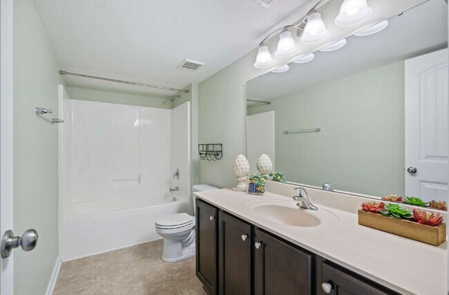 Building Photo - Spacious 3-Bedroom/3.5 Bathroom End-Unit T...