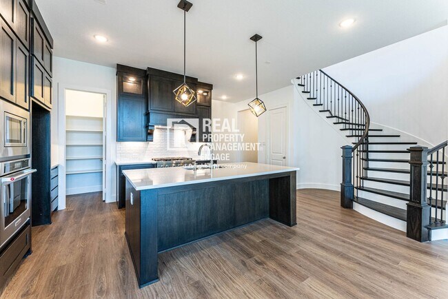 Building Photo - Highly Upgraded Five-Bedroom Home Located ...