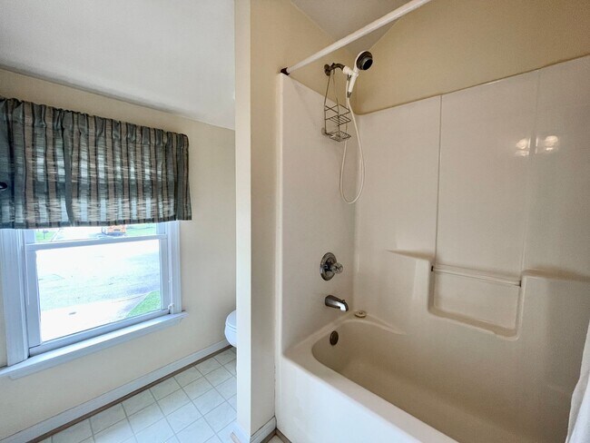 Building Photo - Available NOW! A 4-6 Bedroom Home! Attache...