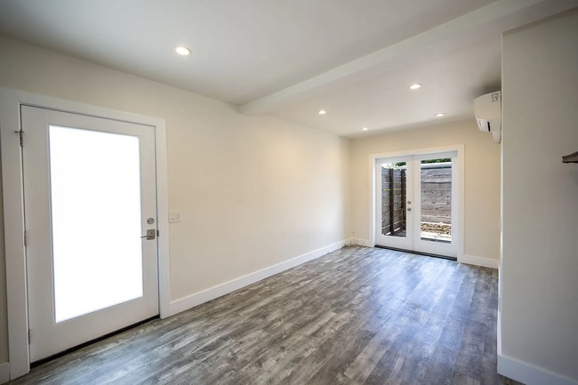 Building Photo - Freshly painted with new interior finishes...