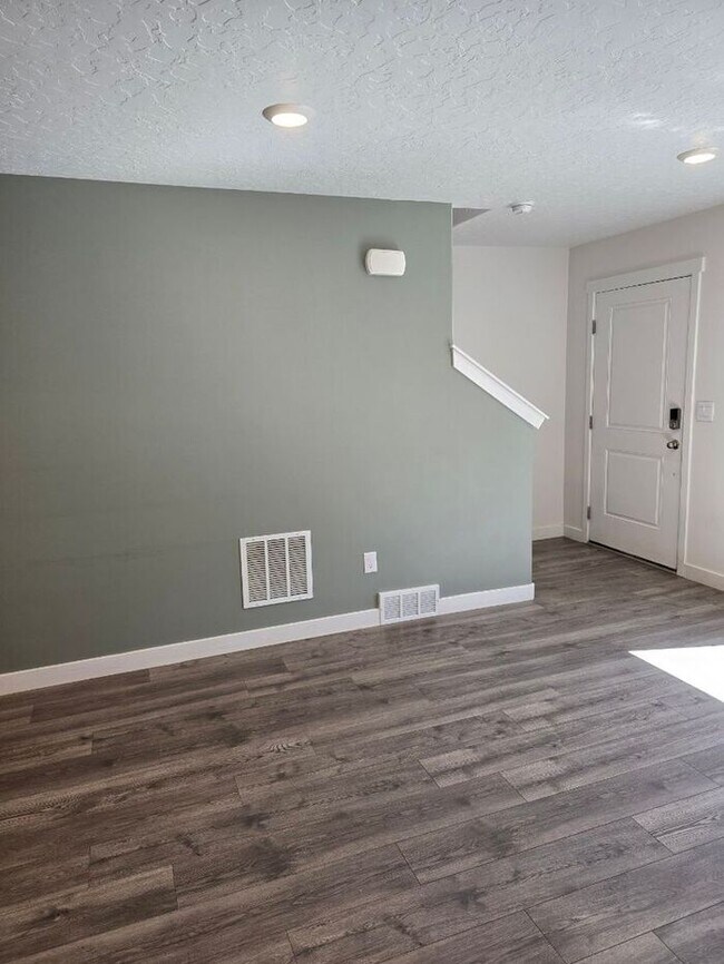 Building Photo - Nearly New, Well Appointed Modern Townhouse w 2 car attached garage