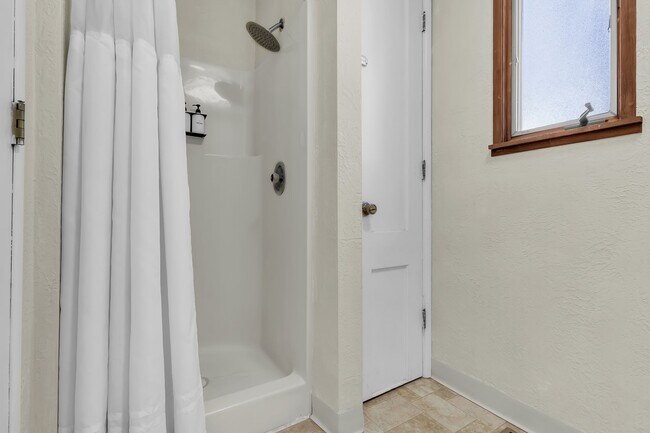 Building Photo - Available for $1,950/month unfurnished or $2,050/month furnished.