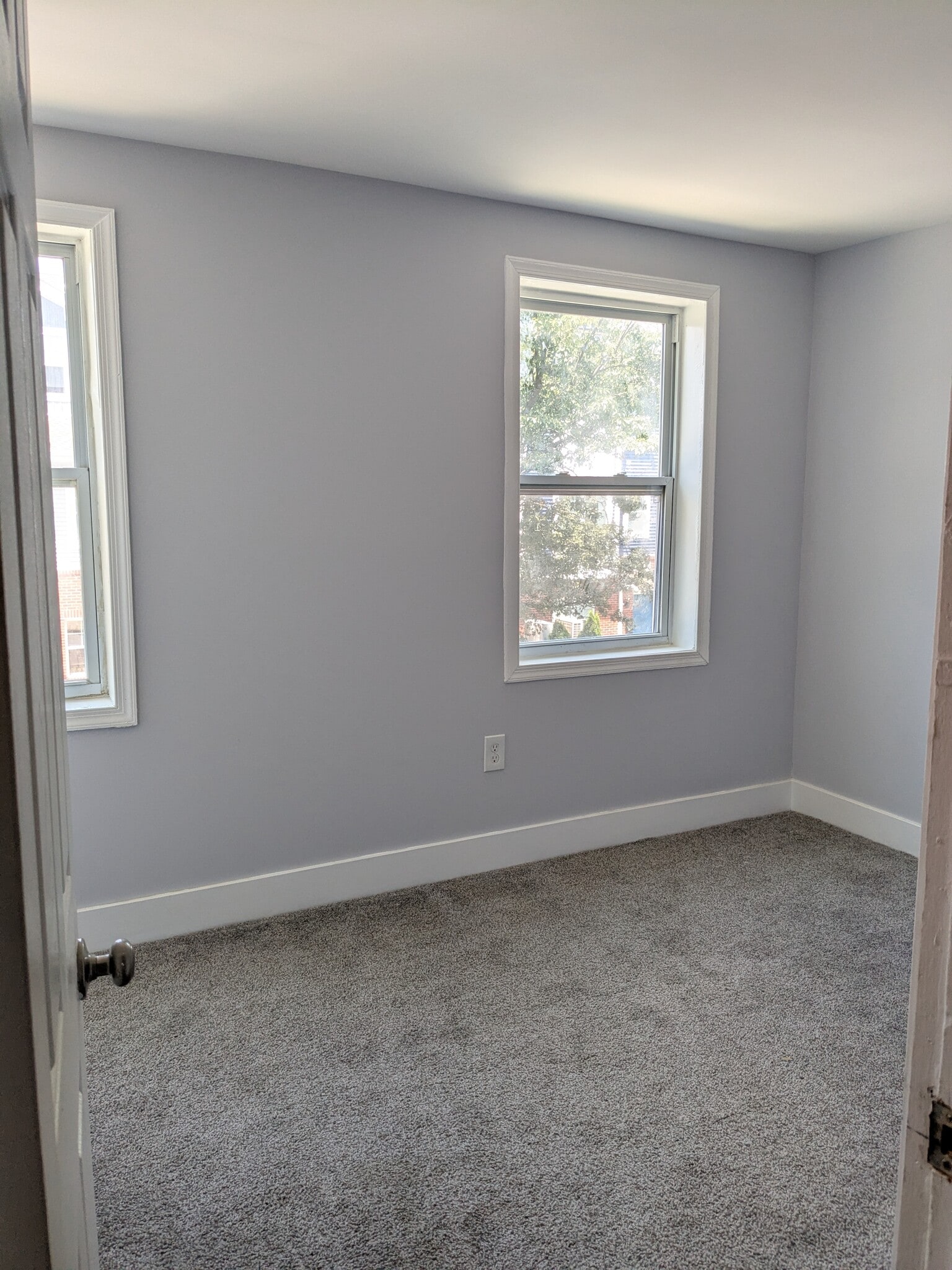 Small bedroom to the left of laundry - 520 E Miner St