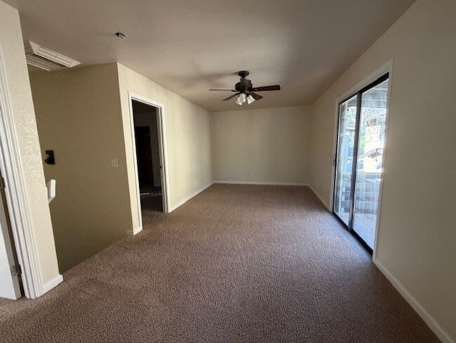 Building Photo - New Paint AND a Yard with a picket fence!