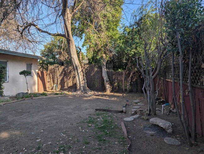 Building Photo - Taylor Wheeler built Fresno High Area home offering wonderful amenities + separate 1 bedroom suite.