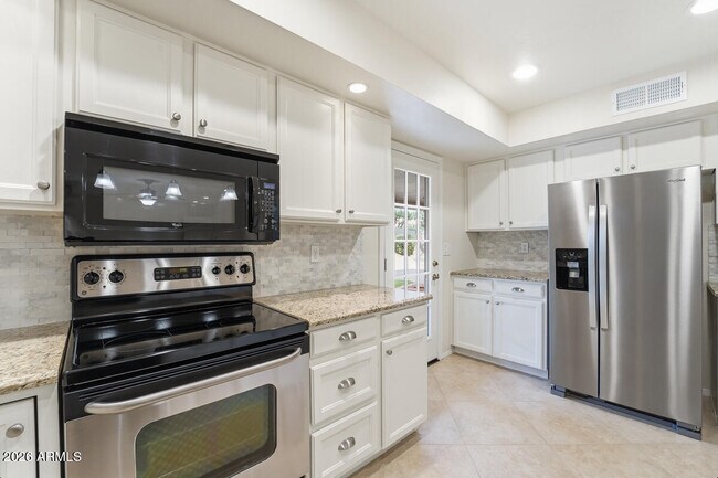 Building Photo - 5720 E Le Marche Ave