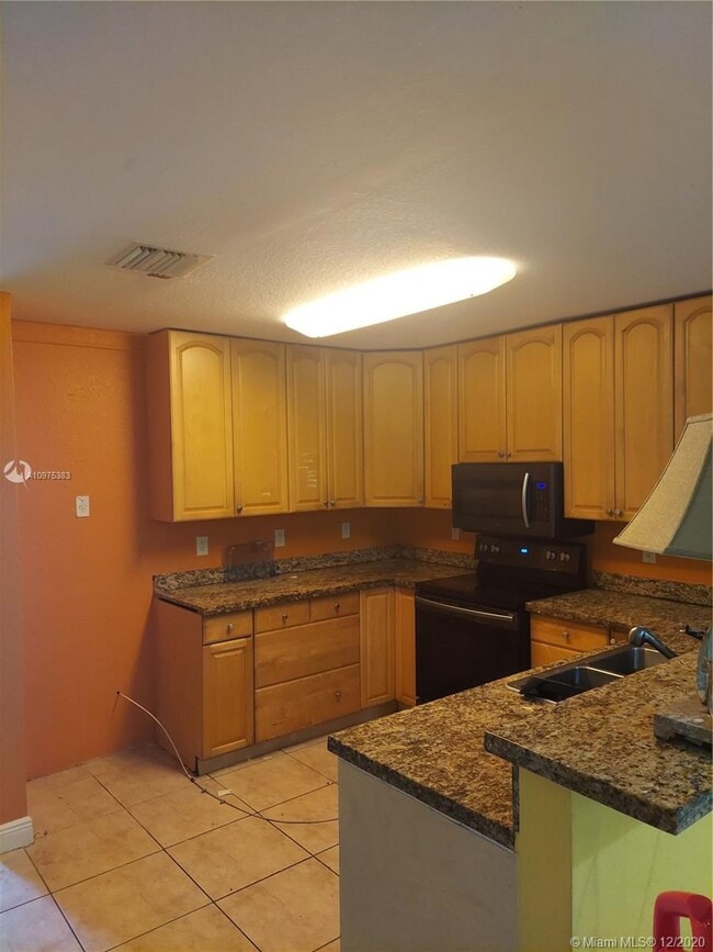 Building Photo - 7991 NW 44th Ct