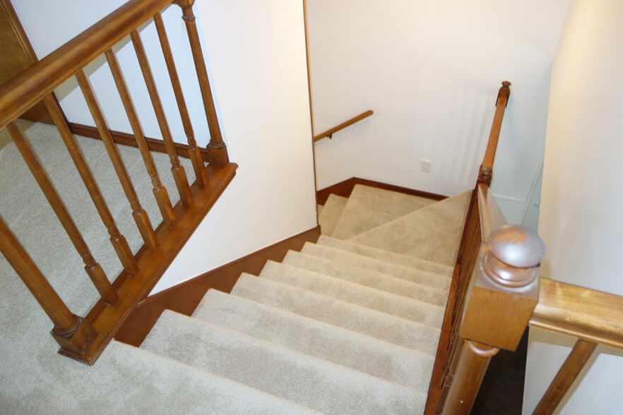 Top of the stairs looking down - 7116 S Indianapolis Ave