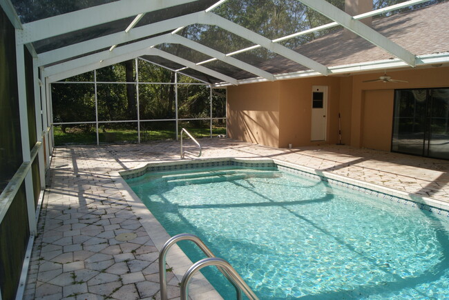 Building Photo - Beautiful Pool Home in River Country Estates