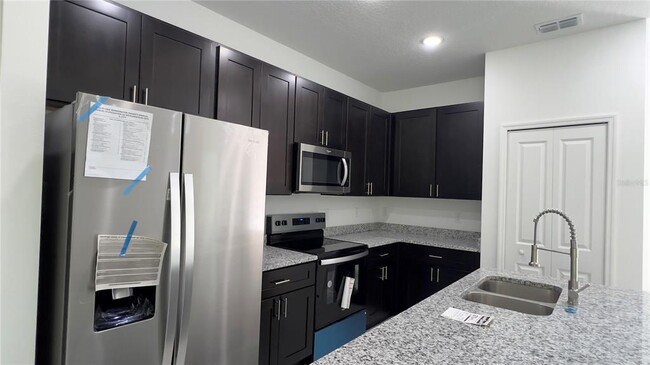 Building Photo - 8610 N Upland Dr