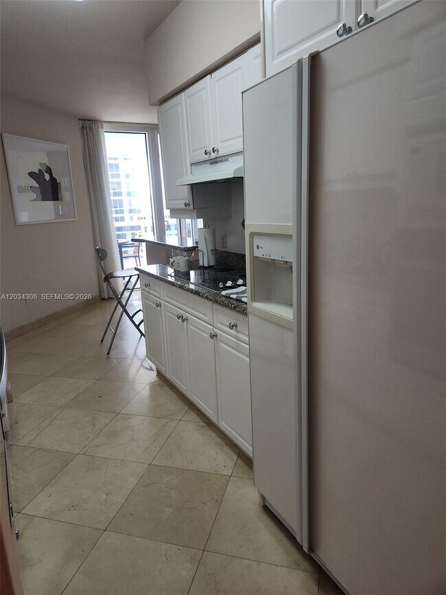 Building Photo - 4779 Collins Ave