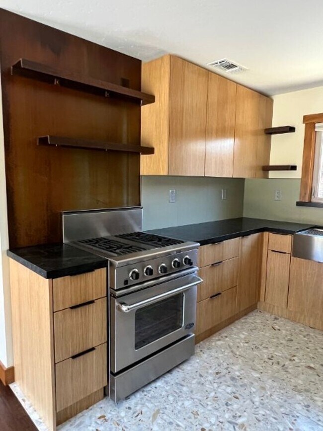 Building Photo - Artisan-Built Custom Cottage Retreat | Private Yard, Garage & EV Charging Ready