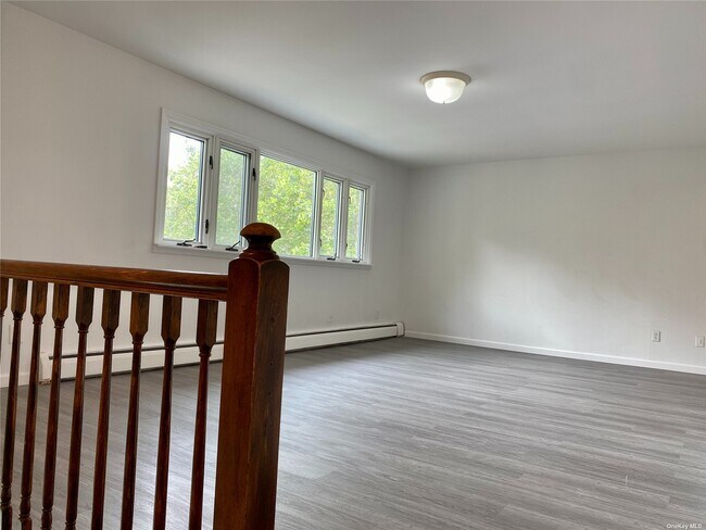 Building Photo - 160-15-16016 16th Ave