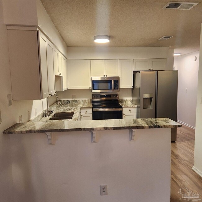 Building Photo - 5001 Grande Dr