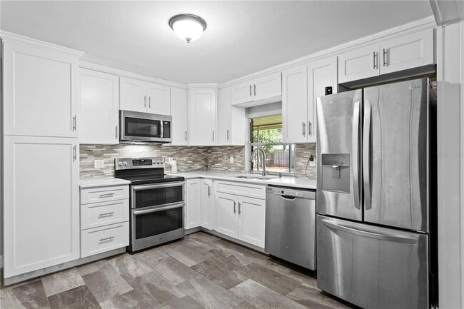 Building Photo - 6928 Greenhill Pl