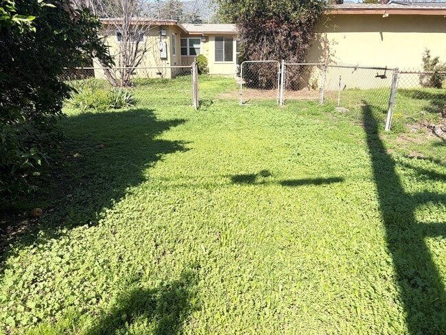 Building Photo - Spacious 3-Bedroom Home with Bonus Room, Bright Sunroom & Large Backyard