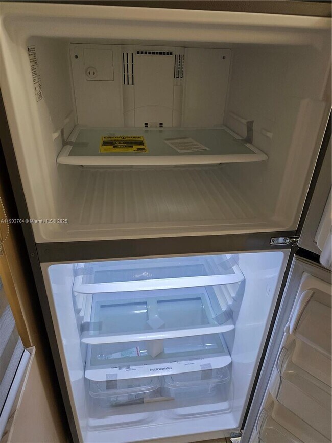 Building Photo - 9917 W Okeechobee Rd