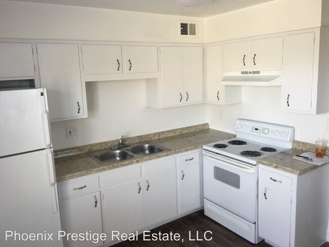 Building Photo - 6027-6041 N 23rd Ave