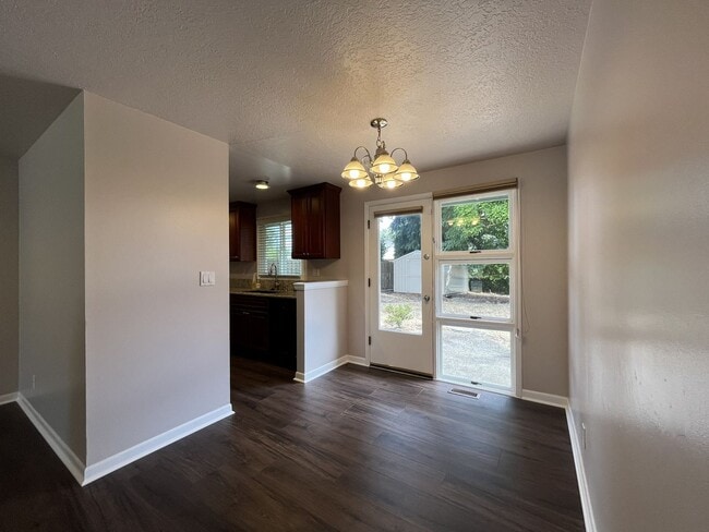 Building Photo - Charming Single-Level 3 Bedroom Home with Spacious Fenced Backyard, Landscaping Included & Great ...
