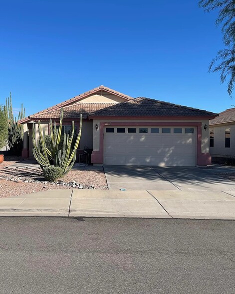 Front street view with desert Landscaping, tile roof - 10608 E Caballero St