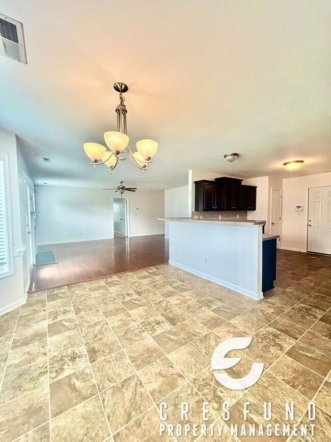Building Photo - Freshly Painted and Spacious 4 Bedroom, 3 ...