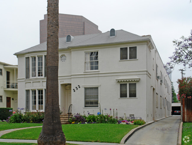 Building Photo - Beachside Suites, & Oak Invest, LLC—To...