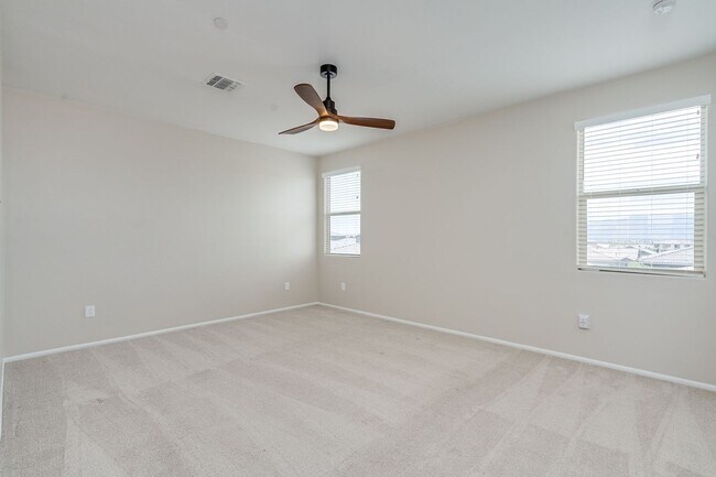 Building Photo - Amazing 4BR 2.5BA Home w/ 3-Car Tandem Garage • Pool Access • Yard w/ Fire Pit in Saguaro Trails